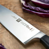 ZWILLING Vier Sterne Kochmesser, Klingenlänge: 20 cm, Rostfreier Spezialstahl, Ergonomischer Kunststoff-Griff, Schwarz [Made in Germany]