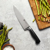 ZWILLING Vier Sterne Kochmesser, Klingenlänge: 20 cm, Rostfreier Spezialstahl, Ergonomischer Kunststoff-Griff, Schwarz [Made in Germany]